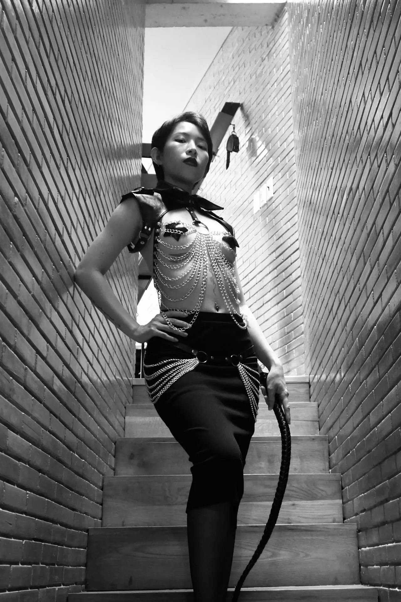 domina trix cầm roi